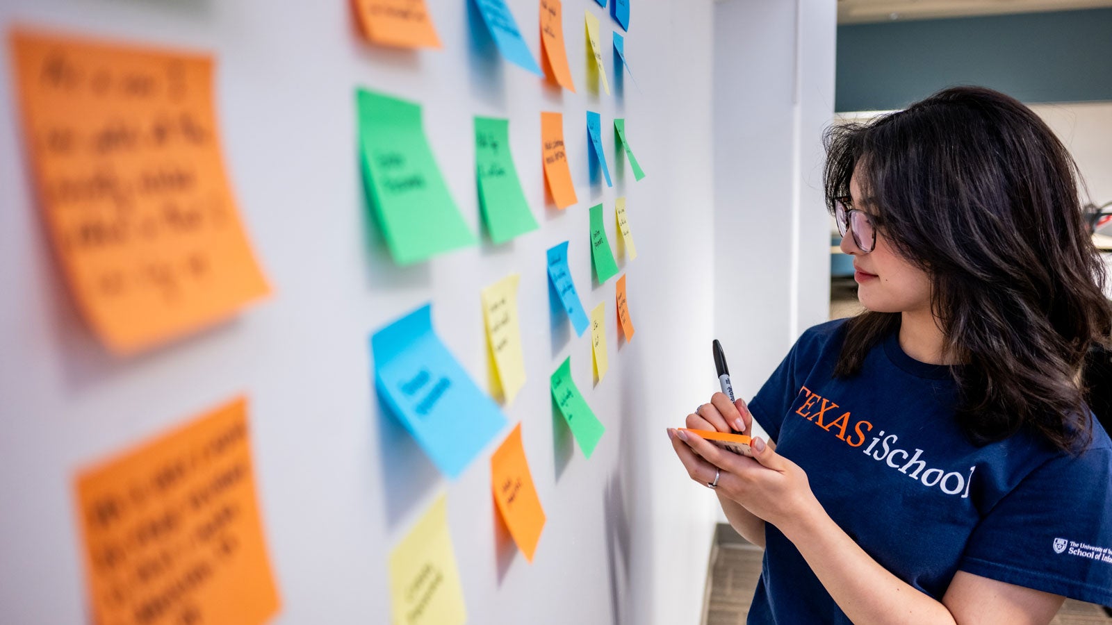 Students collaborating in the Undergraduate Informatics Program.