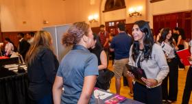 Image of student talking to rep at last career fair