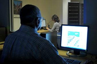 A person observing a test session from the other end of the room