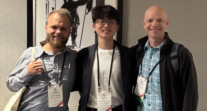 UT iSchool at ACM FAccT 2026 in Montréal. From left: Assistant Professor David Gray Widder, PhD student Woohyeuk Lee, and Professor Matt Lease.