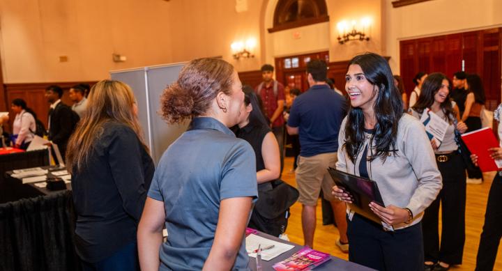 Image of student talking to rep at last career fair