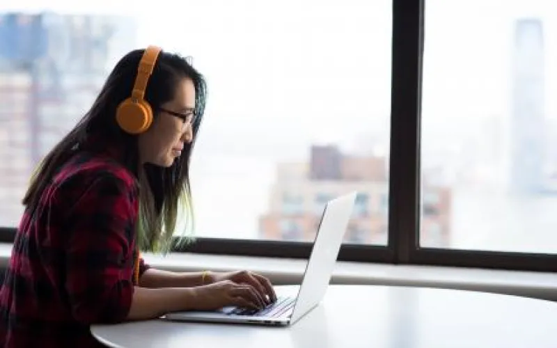 Female-student-working-on-laptop