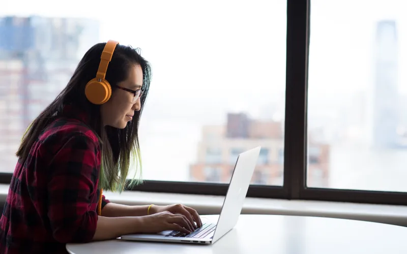 Female student working on laptop