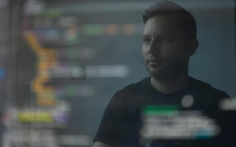 A man behind an informatics mirror