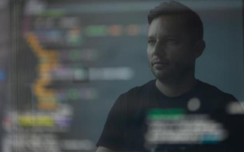 A man behind an informatics mirror